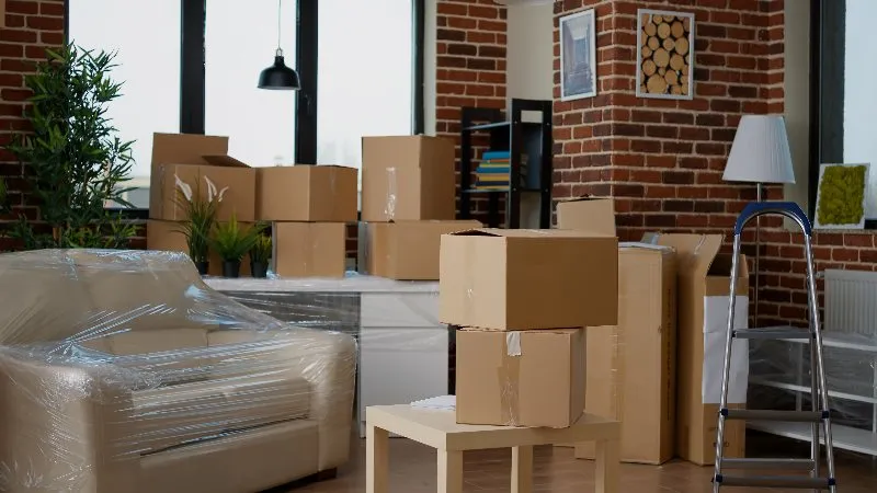 Packed moving boxes stacked and ready to go into storage